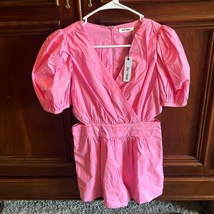 Beautiful Barbie pink dress with side cutouts.